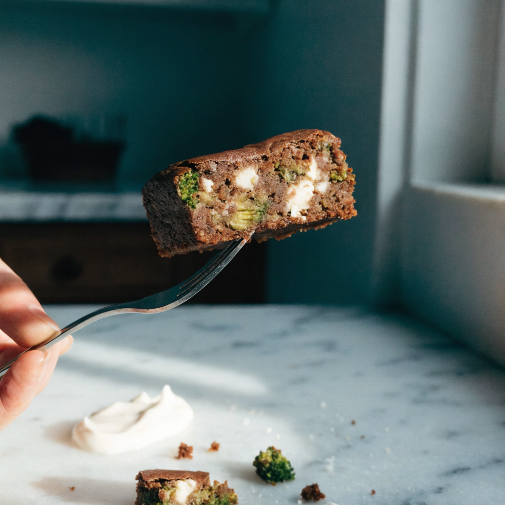 Close-up of broccoli and feta brownie bars